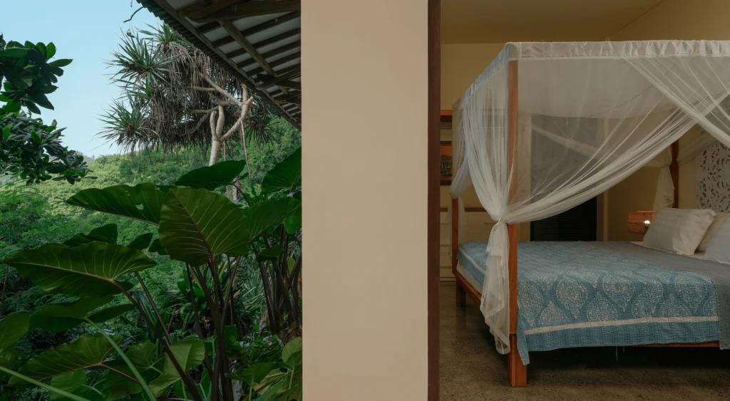 This is the view from the adjoined private terrace of the maste bedroom, it shows beautiful tropical vegetation and the master bedroom. 